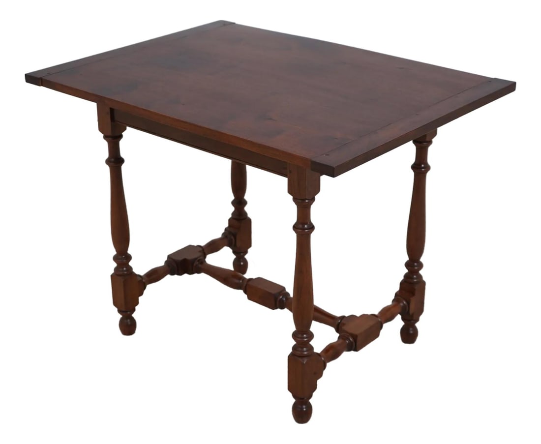 Rustic Walnut Tavern Table with Turned Legs and Breadboard Ends: Rustic Walnut Tavern Table with Turned Legs and Breadboard Ends This exquisite Bench Made Walnut Country Style Tavern Table showcases a timeless design with high-quality craftsmanship. Its notable fea