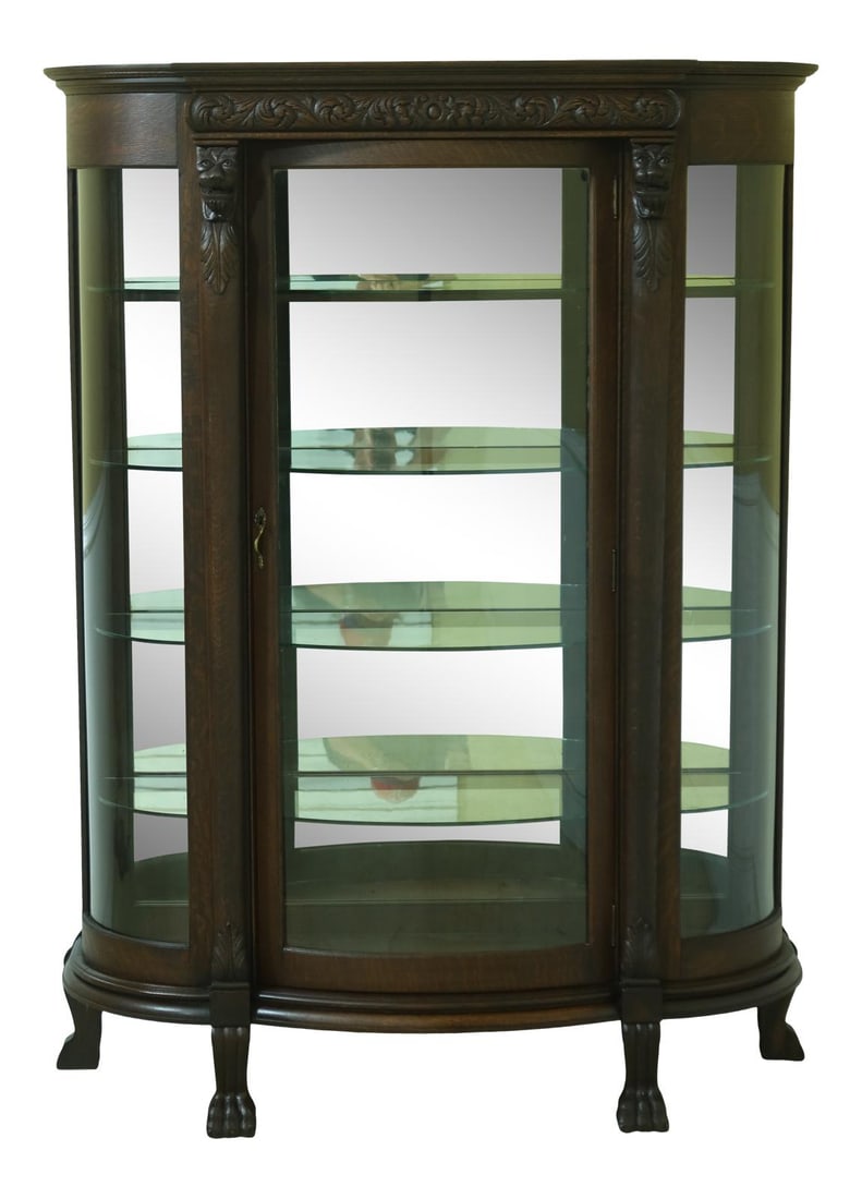 Victorian Oak Lion Carved Bow Front China Cabinet 1890s: Victorian Oak Lion Carved Bow Front China Cabinet 1890s This exquisite Antique Victorian Oak Lion Carved Bow Front China Cabinet, dating back to the 1890s, features fine carved details and high-qualit