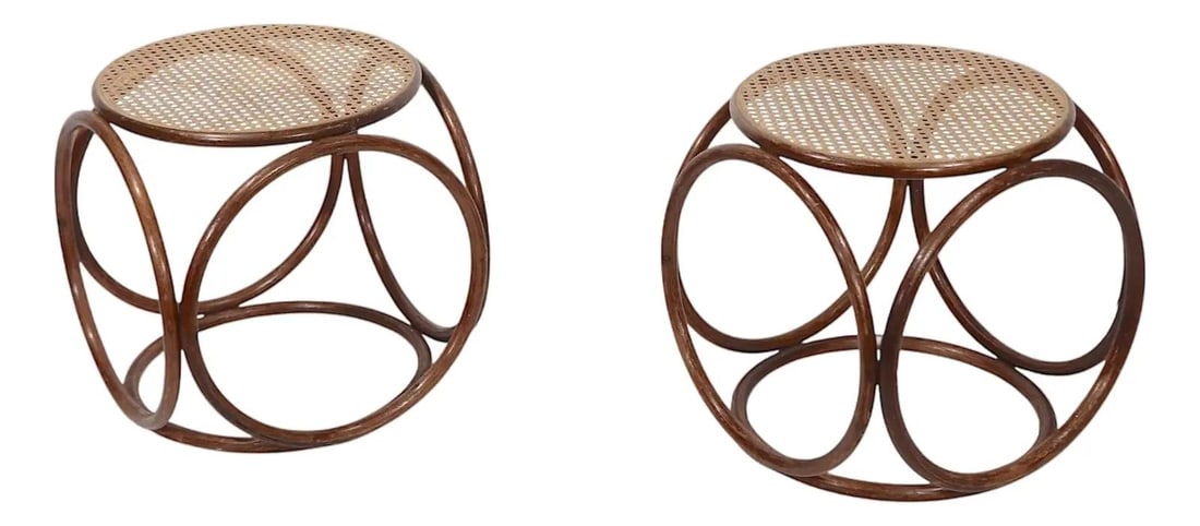 Mid-Century Pair of Thonet Attributed Bentwood Cane Stools: Mid-Century Pair of Thonet Attributed Bentwood Cane Stools This pair of footstools or ottomans showcases a classic design attributed to Michael Thonet, featuring elegant interlocking bentwood rings an