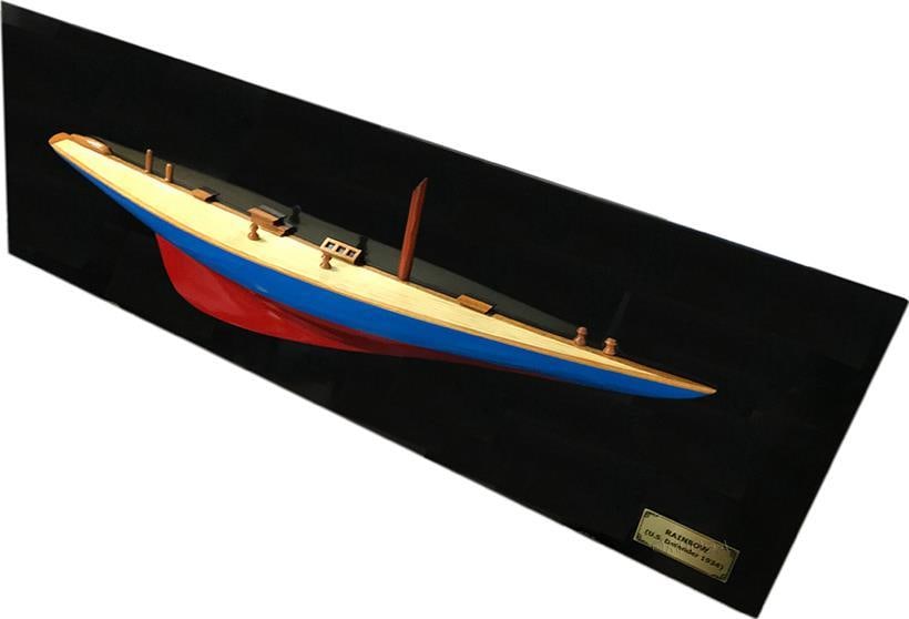 Handcrafted Nautical Rainbow Half-Hull Yacht Decor: Handcrafted Nautical Rainbow Half-Hull Yacht Decor Add a touch of nautical charm to your decor with this handcrafted Rainbow Half-Hull Yacht model. This exquisite piece showcases a vintage-inspired de