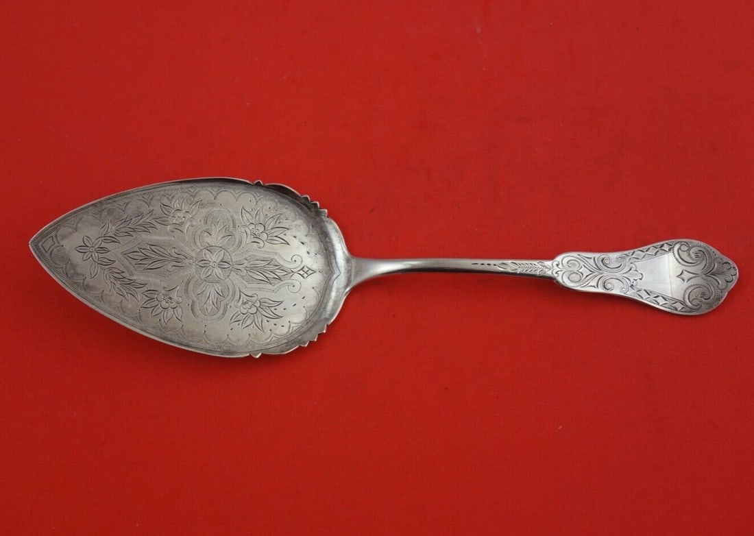 Coin Silver Pie Server by J J Woodward G T Falls 8 7/8 Inch Brite-Cut Handle: Coin Silver Pie Server by J J Woodward G T Falls 8 7/8 Inch Brite-Cut Handle This exquisite pie server features a stunning brite-cut handle and blade, expertly crafted in Coin Silver by various makers