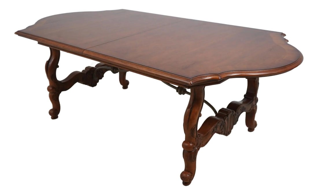 Continental Style Dining Table Cherry Walnut Finish Scrolled Legs Iron Base 2 Leaves: Continental Style Dining Table Cherry Walnut Finish Scrolled Legs Iron Base 2 Leaves This Continental Style Dining Room Table boasts a charming factory distressed finish in rich cherry with walnut ton