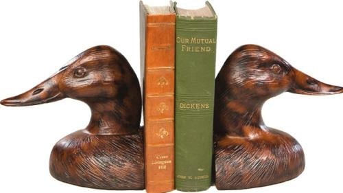 Rustic Lodge Duck Head Bookends Hand-Cast Resin 6H 6.5W 5.5D: Rustic Lodge Duck Head Bookends Hand-Cast Resin 6H 6.5W 5.5D Add a touch of rustic charm to your home with these lifelike Duck Head Bookends. Each piece is meticulously hand-cast and hand-painted, sho