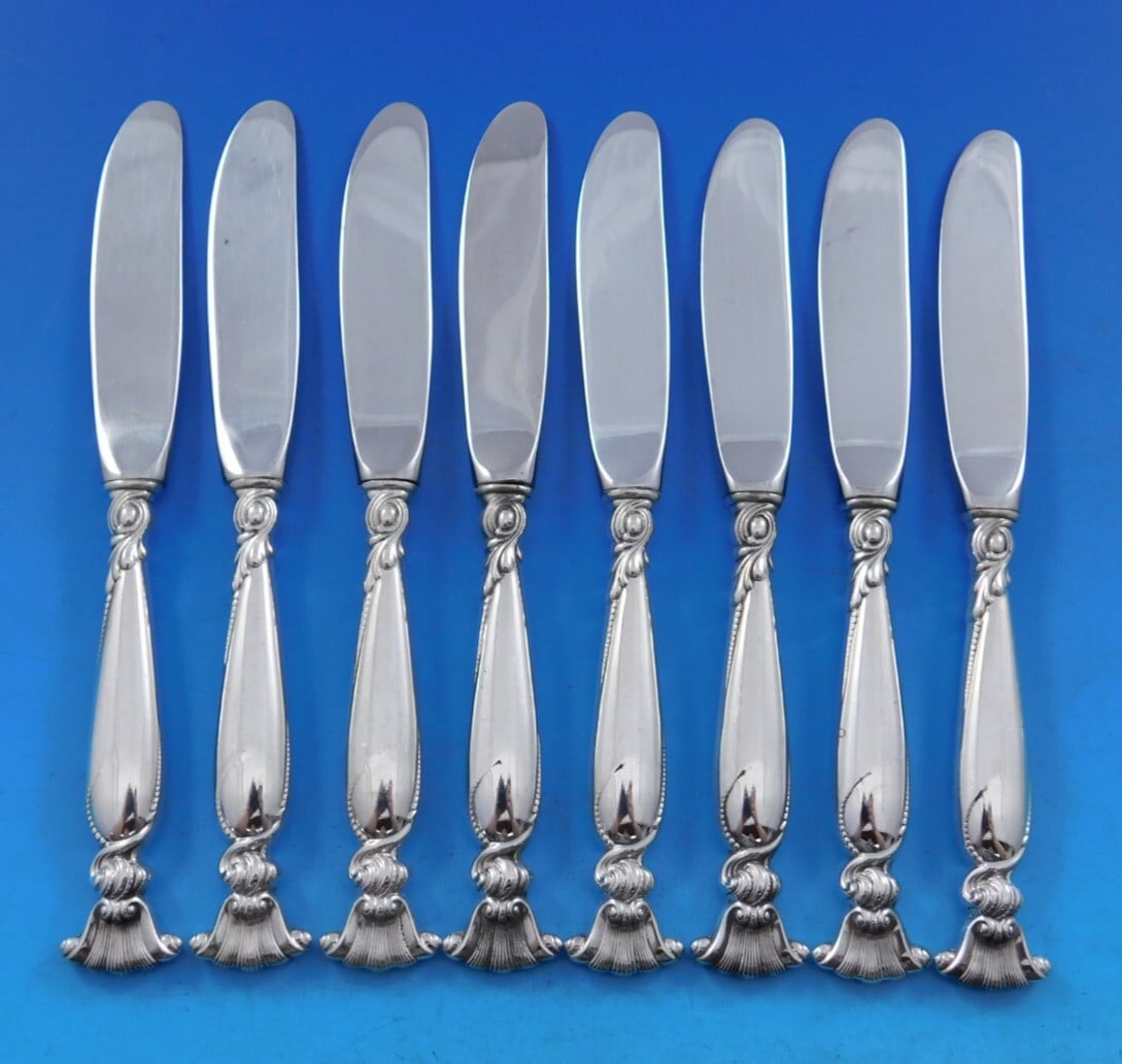 Wallace Romance of the Sea Sterling Silver Butter Spreader Set of 8: Wallace Romance of the Sea Sterling Silver Butter Spreader Set of 8 Enhance your dining experience with this elegant set of 8 butter spreaders from the Romance of the Sea pattern by Wallace. Crafted