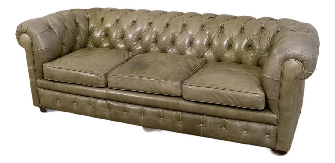 Vintage Green Leather Chesterfield Sofa English Style 3 Seat: Vintage Green Leather Chesterfield Sofa English Style 3 Seat This impressive Chesterfield sofa features a classic English style with a high-quality light green leather upholstery. Approximately 25 yea