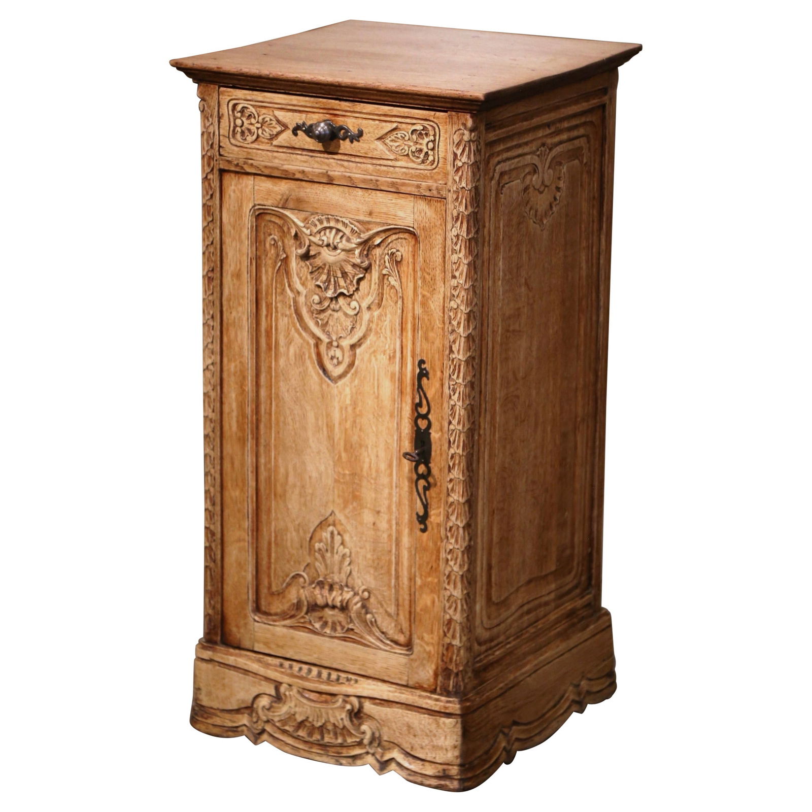 Antique Louis XIV Bleached Oak Confiturier Cabinet from Normandy: Antique Louis XIV Bleached Oak Confiturier Cabinet from Normandy This exquisite early 20th Century French Louis XIV carved bleached oak cabinet from Normandy showcases elegant craftsmanship and timele