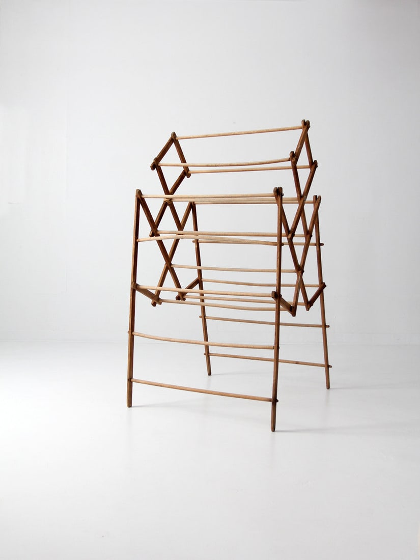 Vintage Free Standing Antique Drying Rack with Patina: Vintage Free Standing Antique Drying Rack with Patina Discover a charming antique free-standing drying rack that combines functionality with rustic elegance. This collapsible wooden rack features a st
