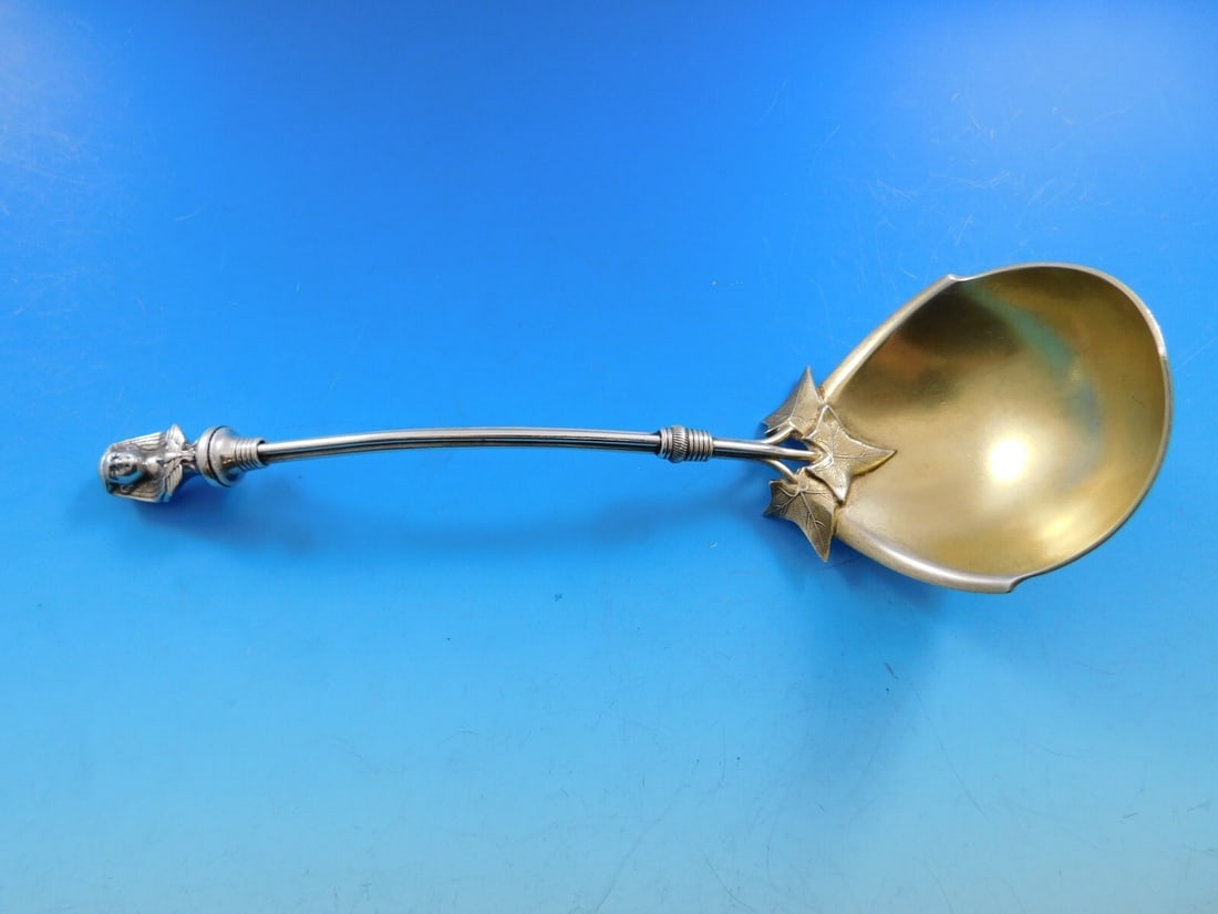 Gorham Egyptian Revival Sterling Silver Gold-Washed Gravy Ladle 7 3/4": Gorham Egyptian Revival Sterling Silver Gold-Washed Gravy Ladle 7 3/4" This exquisite gravy ladle is crafted from sterling silver and features a stunning Egyptian Revival design by Gorham. Measuring 7