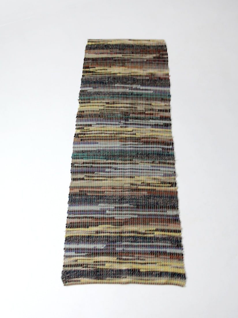 Vintage American Rag Runner Rug 8.5ft Striped Handmade: Vintage American Rag Runner Rug 8.5ft Striped Handmade This vintage American rag rug measures 8.5 ft x 3 ft and showcases a striking striped pattern in deep blues, greens, and browns. Handcrafted as