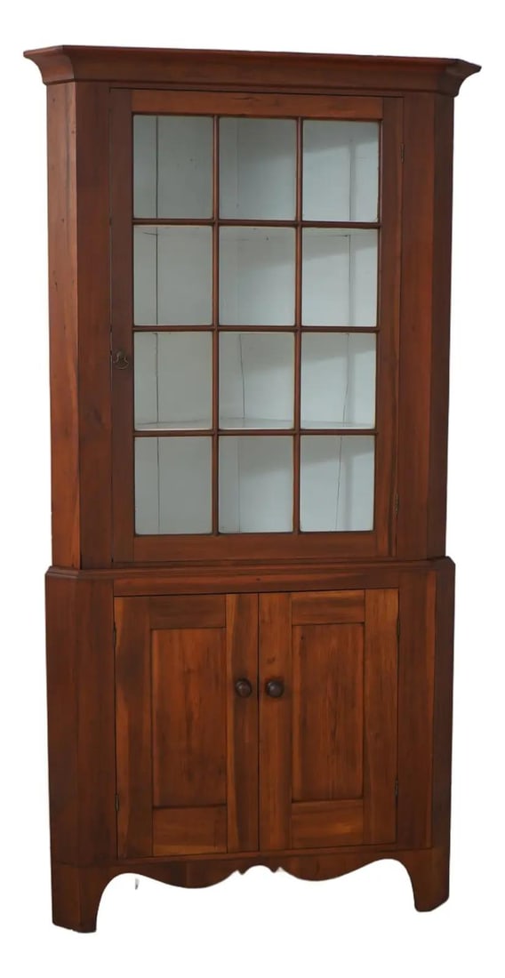 1820-1860 19th Century Cherry Wood 2 Piece Country Corner Cabinet: 1820-1860 19th Century Cherry Wood 2 Piece Country Corner Cabinet This stunning 19th-century cherry corner china cabinet showcases exceptional craftsmanship and timeless elegance. Dating from