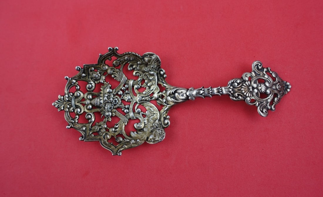 Gorham Sterling Silver Nut Spoon Number 588 Dated July 1893: Gorham Sterling Silver Nut Spoon Number 588 Dated July 1893 This exquisite nut spoon, crafted by Gorham, features a stunning figural design in the 588 pattern. Made of heavy cast sterling silver, it m
