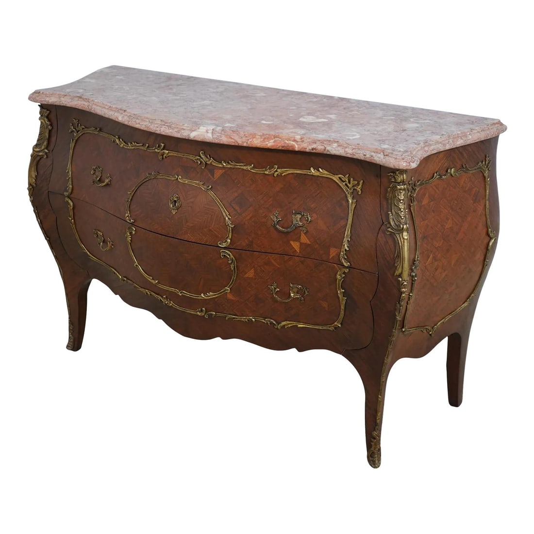 Vintage Louis XV Marquetry Commode with Rose Marble Top: Vintage Louis XV Marquetry Commode with Rose Marble Top This exquisite Vintage French Louis XV commode features a stunning rose marble top and showcases a beautiful marquetry inlaid surface. Crafted i