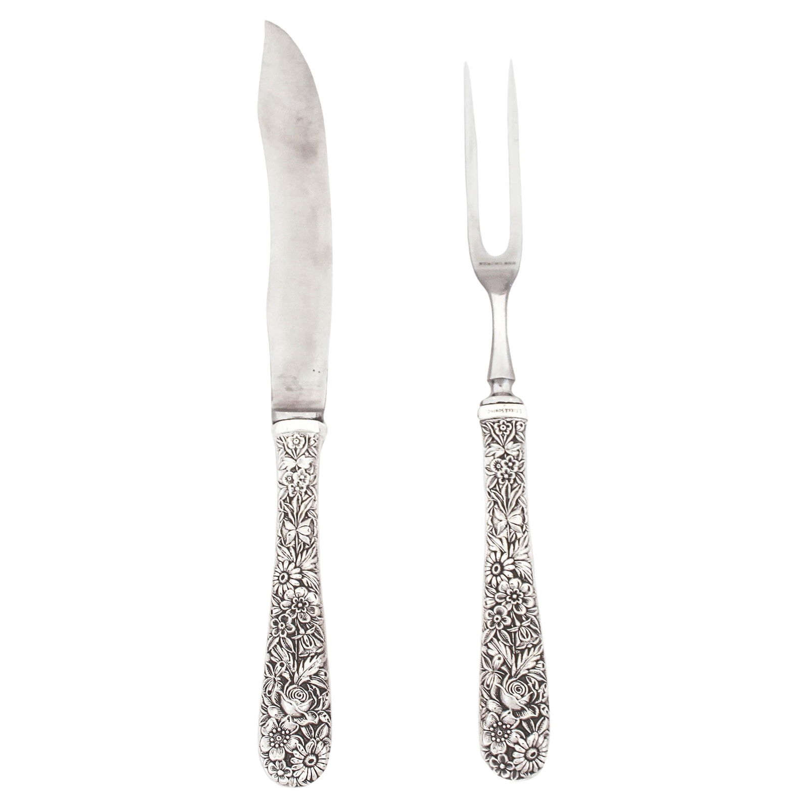 Kirk-Stieff Rose Sterling Silver Carving Set of 2 1937: Kirk-Stieff Rose Sterling Silver Carving Set of 2 1937 Enhance your dining experience with this exquisite Rose Sterling Carving Set, featuring a beautifully designed fork and knife. Crafted from