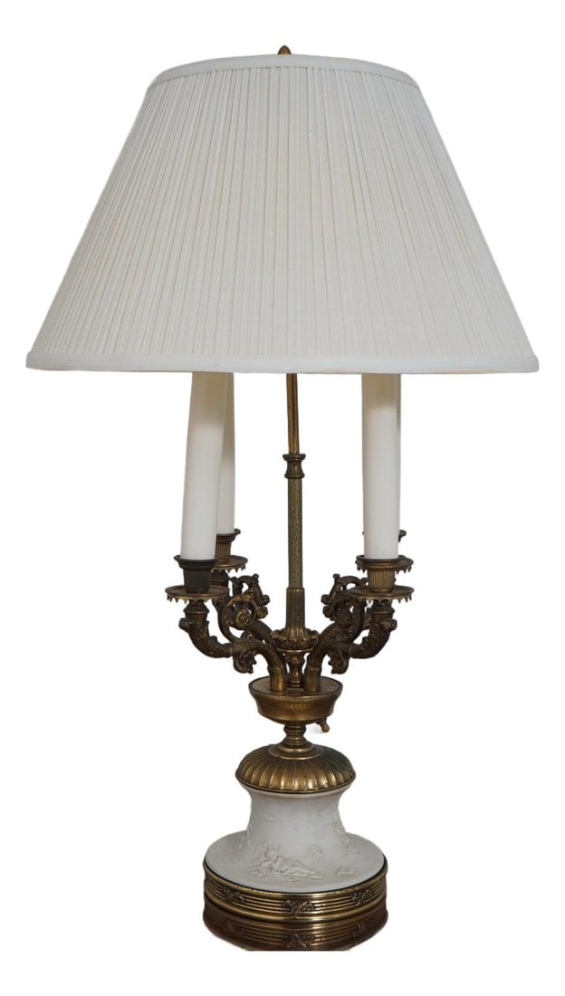 Italian Neoclassical Cherub Bisque Table Lamp with Brass Accent: Italian Neoclassical Cherub Bisque Table Lamp with Brass Accent Illuminate your space with this exquisite Italian Neoclassical bisque base table lamp. Featuring a beautifully detailed cherub design cr