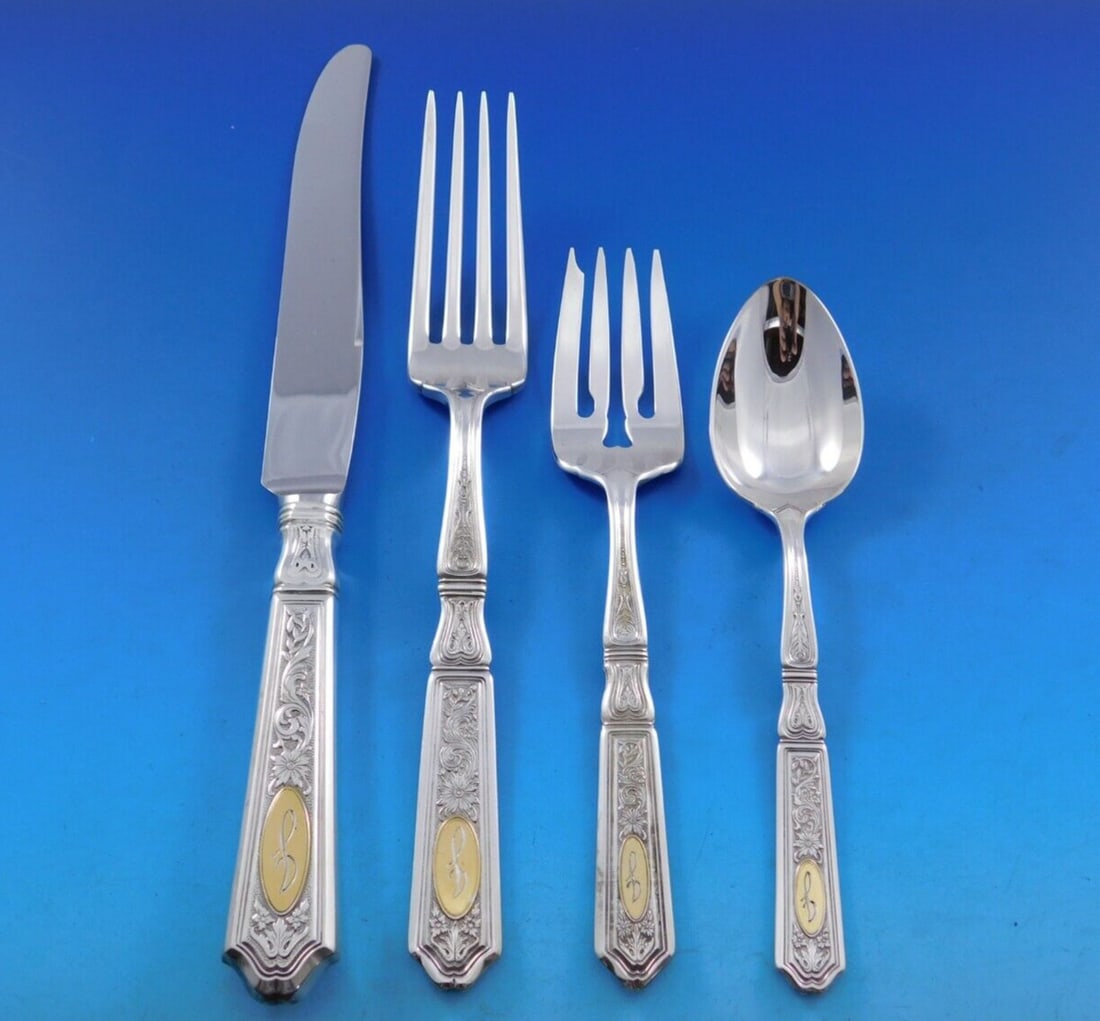 Gorham Saint Dunstan Chased Gold Sterling Silver Flatware Set 32pc Service for 8 J Monogram: Gorham Saint Dunstan Chased Gold Sterling Silver Flatware Set 32pc Service for 8 J Monogram Enhance your dining experience with this exquisite Saint Dunstan Chased Gold Sterling Silver Flatware Set by