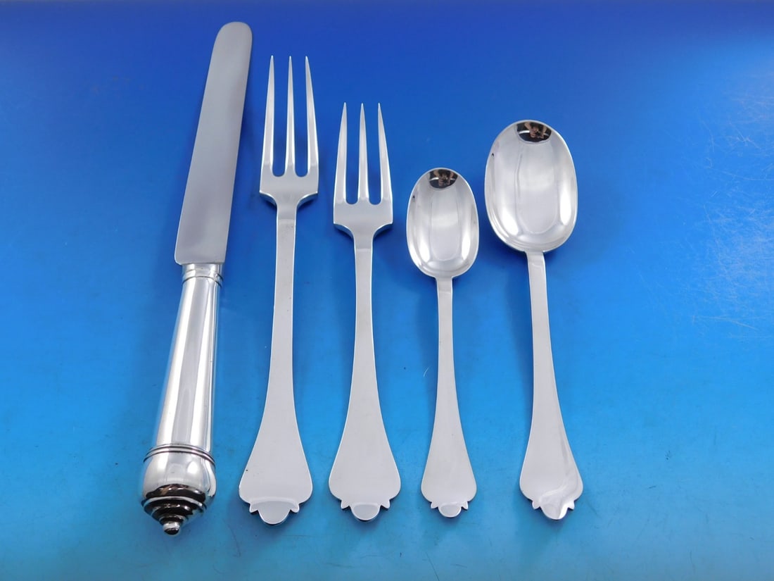 60 Piece Sterling Silver Trifid Flatware Set for 12 by James Robinson: 60 Piece Sterling Silver Trifid Flatware Set for 12 by James Robinson This Trifid pattern flatware set by James Robinson features 60 pieces of handcrafted sterling silver, made in Sheffield, England.