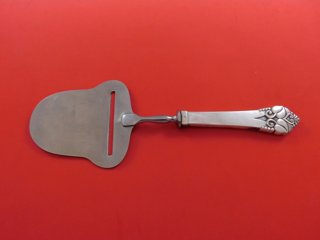 Orla Vagn Mogensen Greta Sterling Silver Cheese Plane 9 Inch: Orla Vagn Mogensen Greta Sterling Silver Cheese Plane 9 Inch Introducing the Greta Cheese Plane, a stunning piece designed by Orla Vagn Mogensen. This elegant cheese plane features a solid sterling si