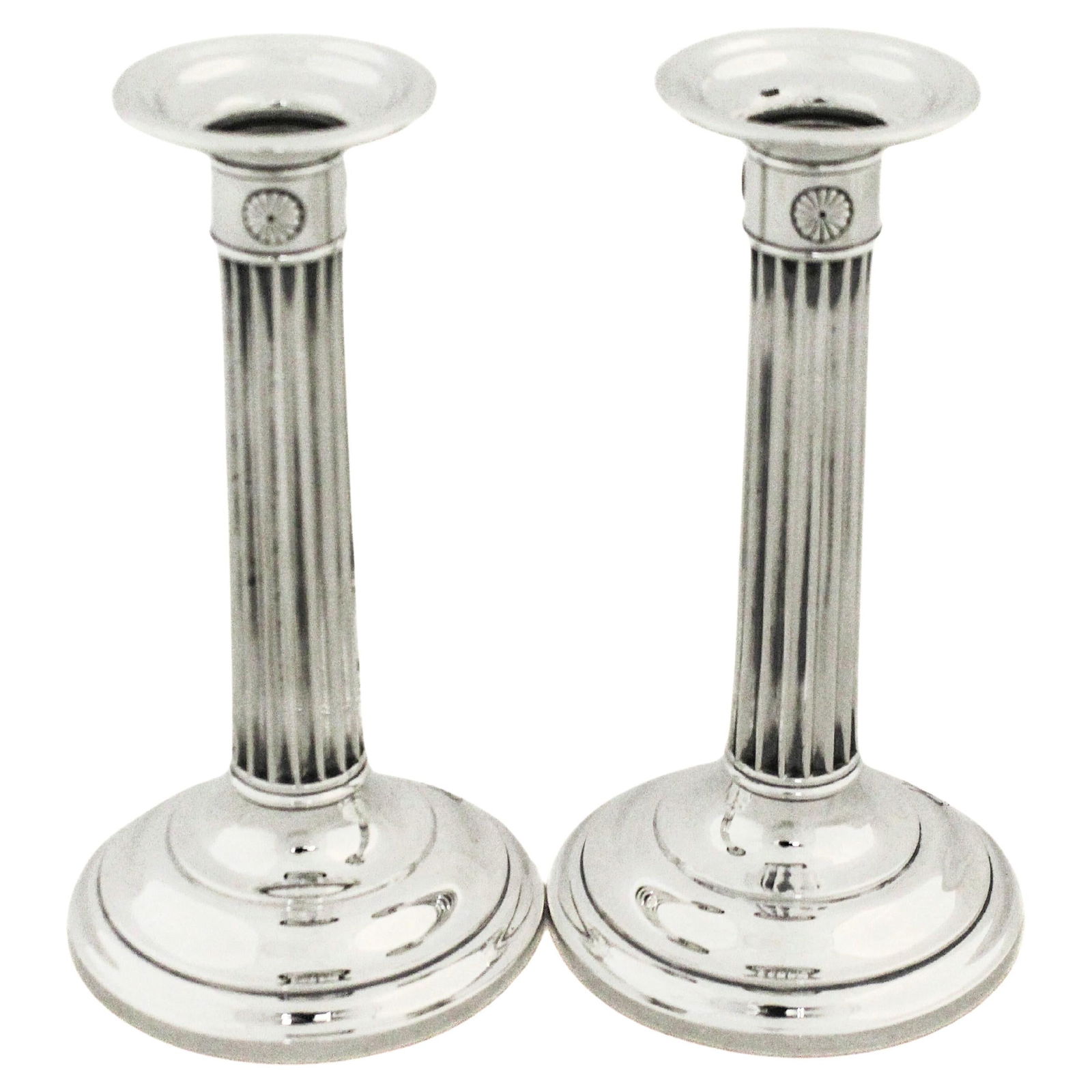 Pair of Gorham 1918 Sterling Silver Fluted Column Candlesticks: Pair of Gorham 1918 Sterling Silver Fluted Column Candlesticks This set of two sterling silver candlesticks by Gorham Silversmiths exemplifies early 20th-century classical design. Each candlestick fea