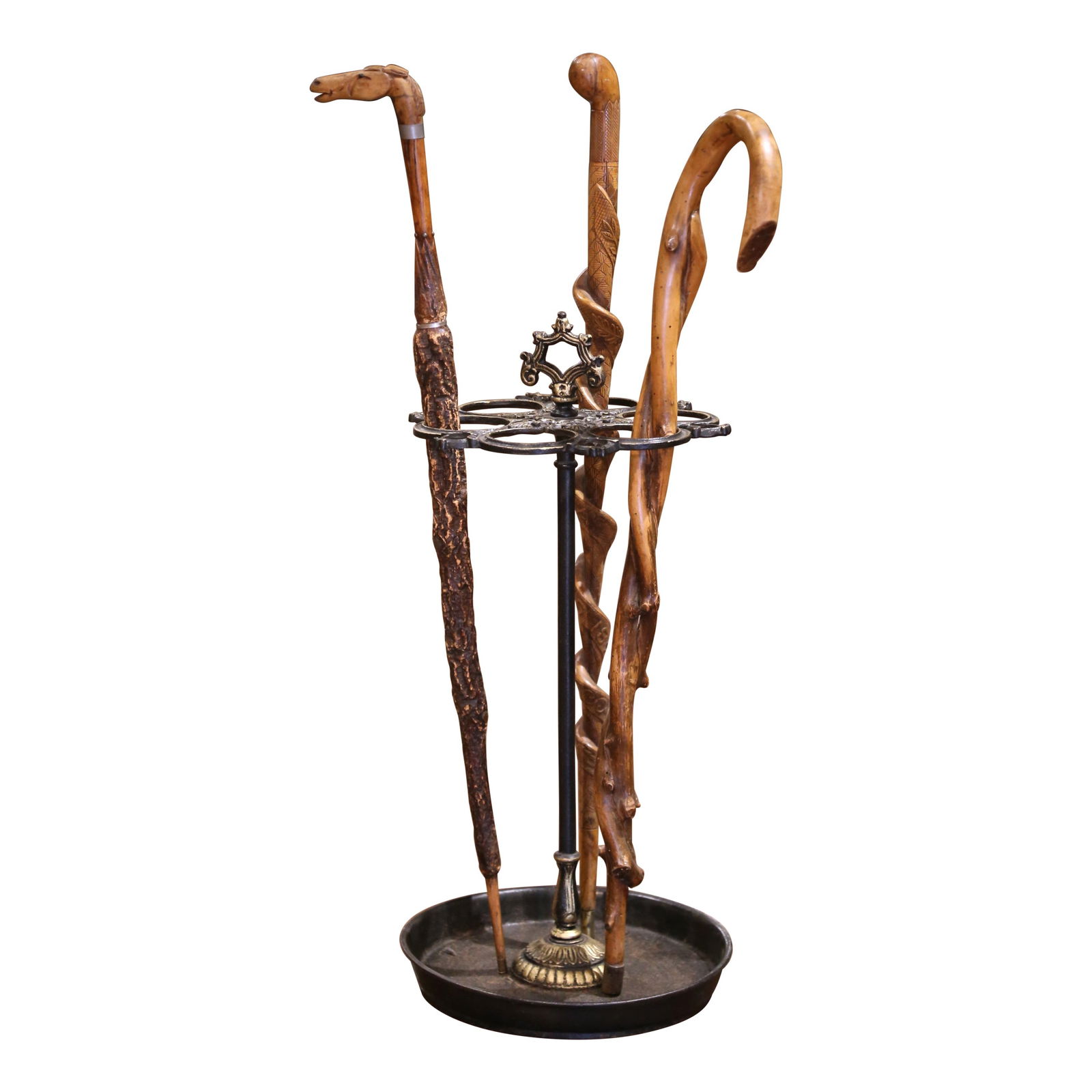 Antique French Gilt Iron Cane Holder with 3 Canes 25.5" Tall: Antique French Gilt Iron Cane Holder with 3 Canes 25.5" Tall Enhance your entryway or mudroom with this exquisite early 20th-century gilt iron cane holder, handcrafted in France around 1920. This eleg