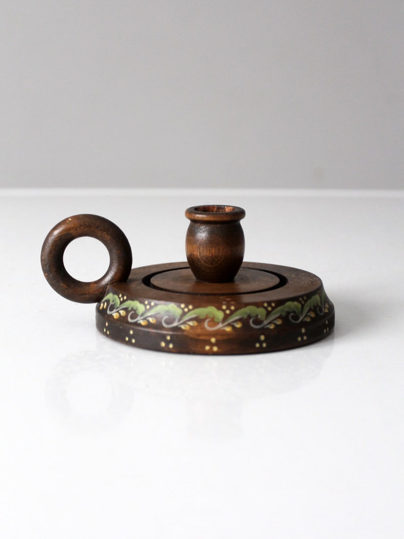 Vintage Hand-Painted Wooden Chamberstick Candle Holder: Vintage Hand-Painted Wooden Chamberstick Candle Holder Enhance your space with this vintage hand-painted wooden chamberstick candle holder. Featuring a charming ring handle and an intricately painted