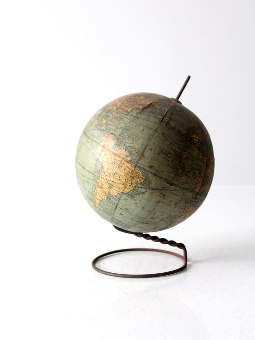Rare C.F. Weber 6 Inch Globe 1906 with Twisted Wire Base: Rare C.F. Weber 6 Inch Globe 1906 with Twisted Wire Base This exceptional C.F. Weber globe, measuring 6 inches in diameter, dates back to 1906. It is elegantly supported by a twisted wire circular bas