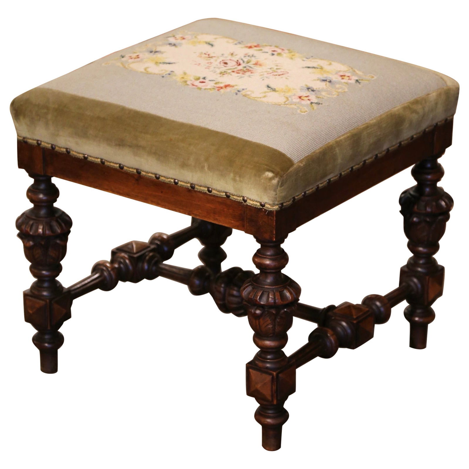 19th Century Louis XIV Walnut Stool with Floral Needlepoint Tapestry: 19th Century Louis XIV Walnut Stool with Floral Needlepoint Tapestry This exquisite 19th Century French Louis XIV carved walnut stool showcases the artistry and elegance characteristic of the period.