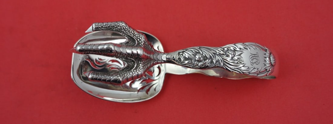 Tiffany & Co Chrysanthemum Sterling Silver Ice Tong 5 3/4": Tiffany & Co Chrysanthemum Sterling Silver Ice Tong 5 3/4" Elevate your serving experience with this exquisite ice tong from Tiffany & Co., part of the iconic Chrysanthemum pattern. Crafted from high-