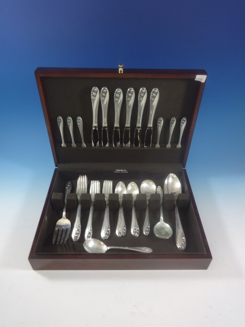 Gorham Lily of the Valley Sterling Silver Flatware Set 40 Pieces: Gorham Lily of the Valley Sterling Silver Flatware Set 40 Pieces This exquisite Lily of the Valley flatware set by Gorham is composed of 40 pieces of sterling silver, showcasing timeless elegance for