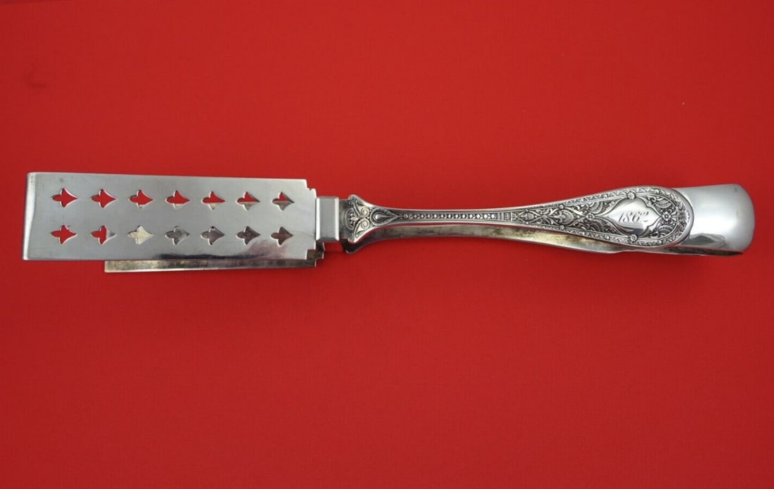 Whiting Persian Sterling Silver Asparagus Tong 12 Inch Yolked Pierced: Whiting Persian Sterling Silver Asparagus Tong 12 Inch Yolked Pierced This exquisite serving piece, the Persian Asparagus Tong by Whiting, is crafted from sterling silver and measures 12 inches in