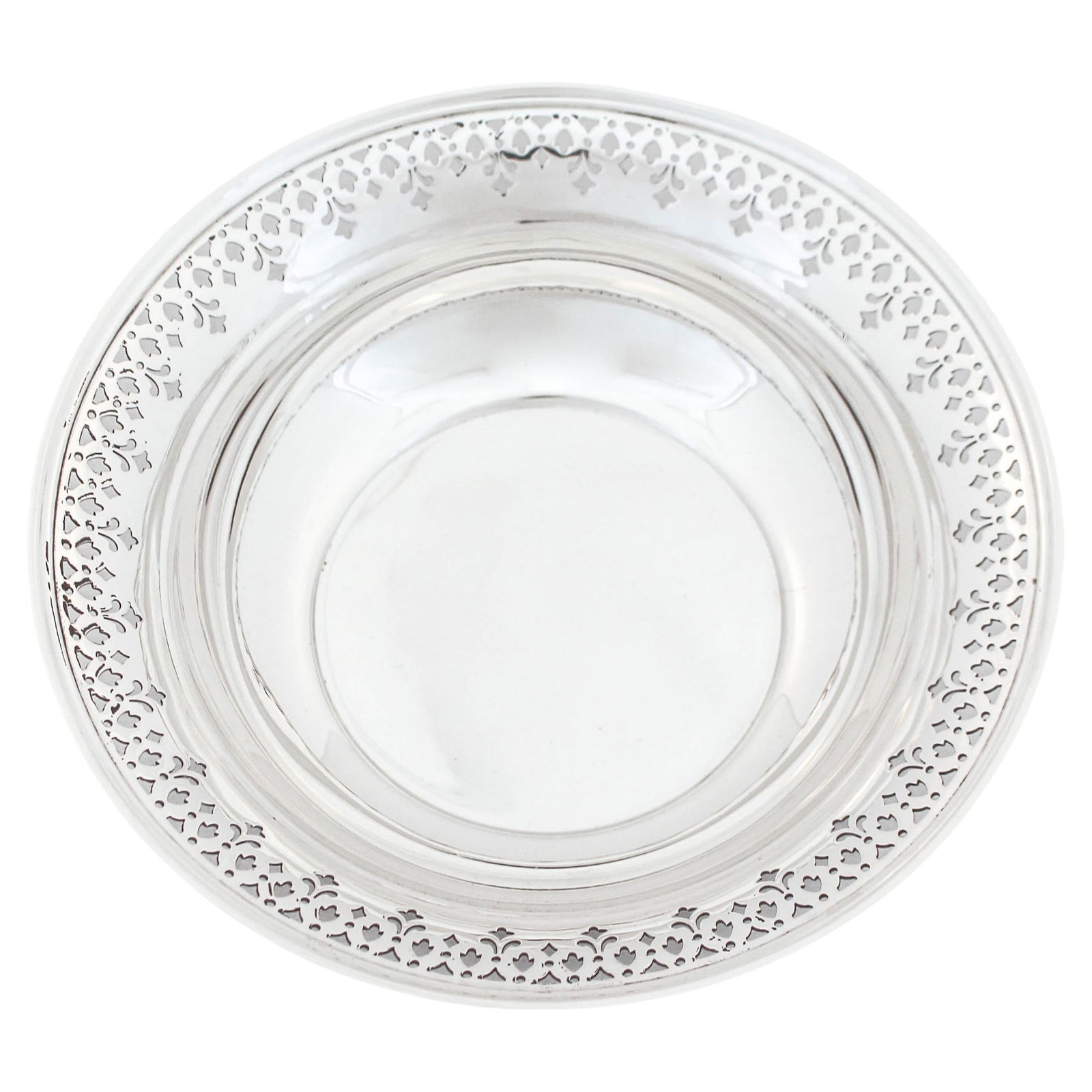 Tiffany & Co Sterling Silver Bowl with Cutout Design 1930s: Tiffany & Co Sterling Silver Bowl with Cutout Design 1930s This exquisite sterling silver bowl from Tiffany & Co. features a unique cutout design along the upper edge, allowing you to appreciate its c