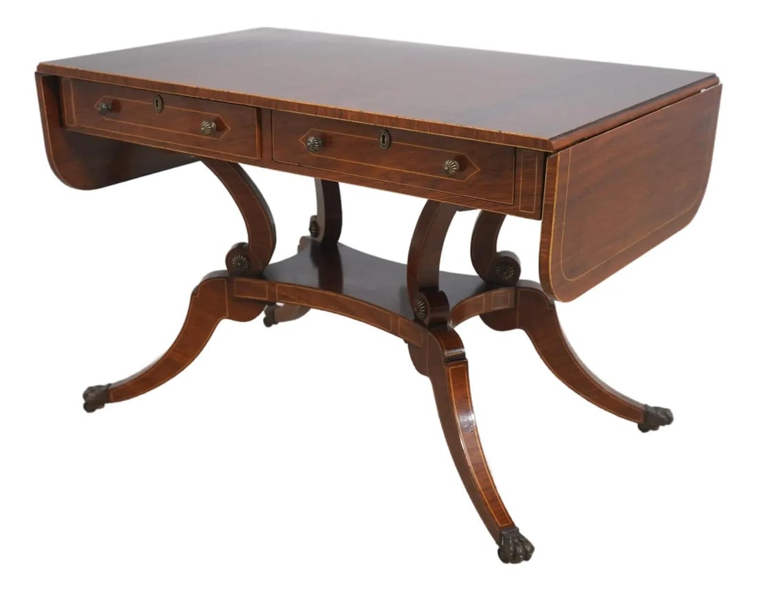 Rosewood Regency Style Drop Leaf Library Table With Two Drawers: Rosewood Regency Style Drop Leaf Library Table With Two Drawers This vintage Regency style dropleaf library table from the 1990s features stunning rosewood construction with an oak secondary and solid