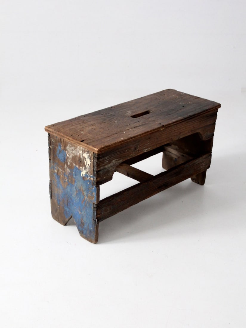 Rustic Antique Farmhouse Wooden Bench Early 20th Century: Rustic Antique Farmhouse Wooden Bench Early 20th Century This antique wooden bench embodies rustic farmhouse charm from the early 20th century. It features a slotted handle top and shows distressed bl