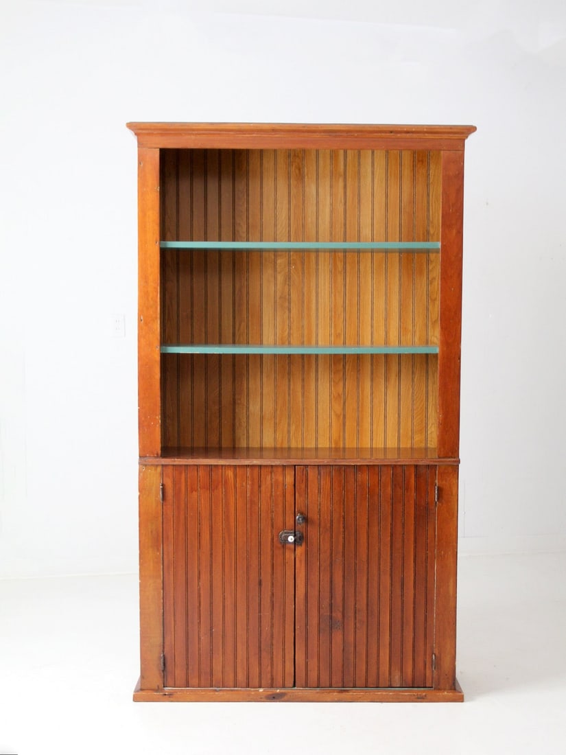 Classic 19th Century Antique Pantry Cabinet from Monroe Wisconsin: Classic 19th Century Antique Pantry Cabinet from Monroe Wisconsin This stunning antique pantry cabinet hails from the late 19th century and showcases a classic American design. Recovered from a histor