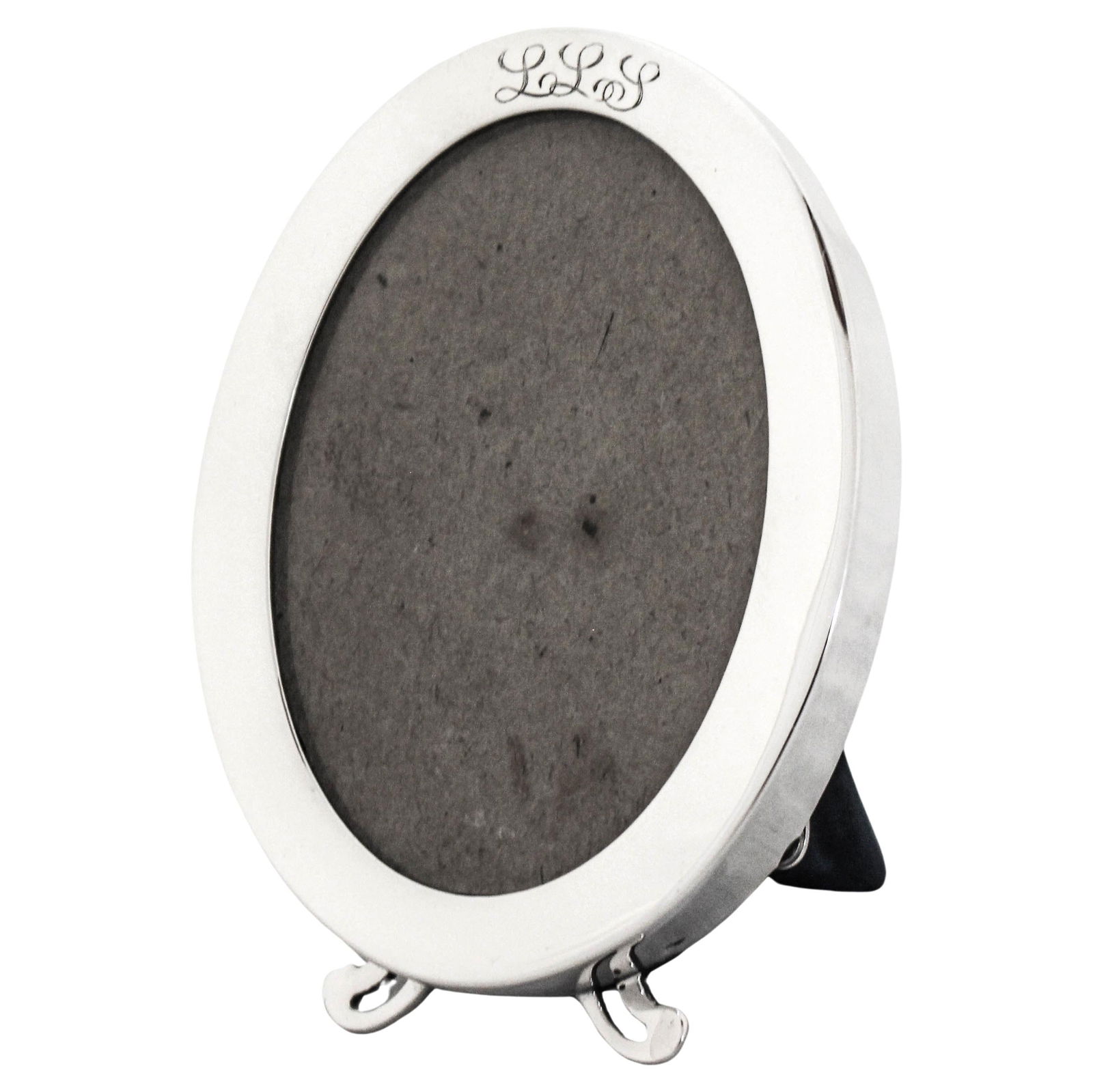 Art Deco Sterling Silver Frame by Lebkuecher & Co 1918: Art Deco Sterling Silver Frame by Lebkuecher & Co 1918 This exquisite Sterling Silver Art Deco Frame showcases a sleek and elegant design, perfect for displaying cherished memories. Crafted by Lebkuec