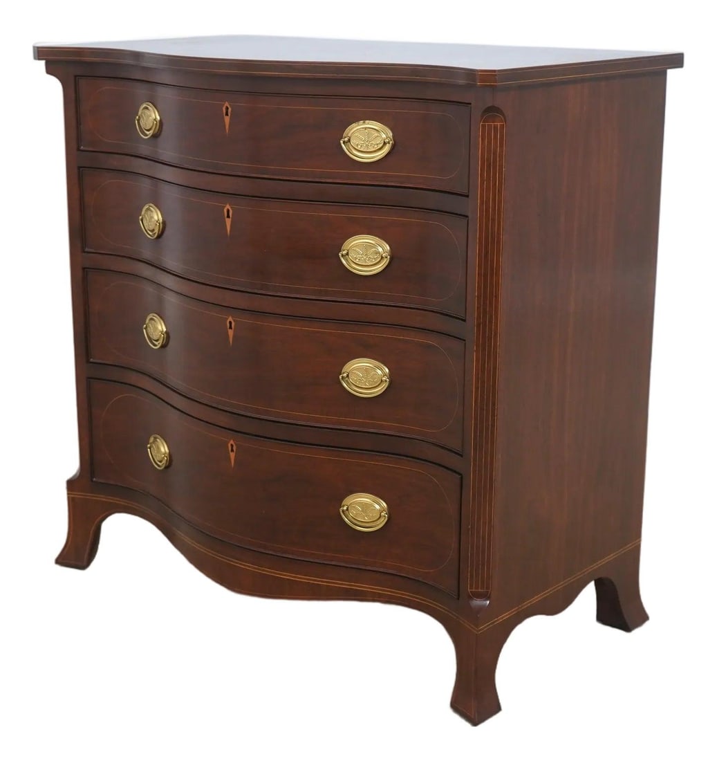 Mahogany Chest with Inlay Serpentine Front by Baker Colonial Williamsburg: Mahogany Chest with Inlay Serpentine Front by Baker Colonial Williamsburg This Baker Colonial Williamsburg Virginia chest from the 1990s features a serpentine curved front and inlaid mahogany construc
