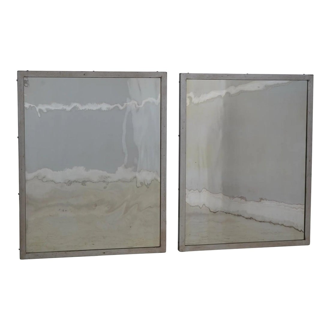 Pair of Industrial Metal Frame Distressed Mirrors 24 x 30: Pair of Industrial Metal Frame Distressed Mirrors 24 x 30 Enhance your space with this exquisite pair of industrial-style mirrors. Each mirror features a heavy metal frame with a stunning distressed