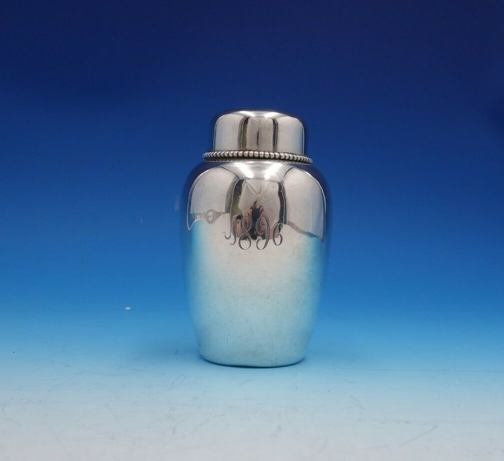 Shiebler Bead Sterling Silver Tea Caddy 5" Tall 6.8oz Monogrammed 1896: Shiebler Bead Sterling Silver Tea Caddy 5" Tall 6.8oz Monogrammed 1896 This exquisite tea caddy, crafted by Shiebler, showcases the elegant Bead pattern in fine sterling silver. Standing at 5 inches t