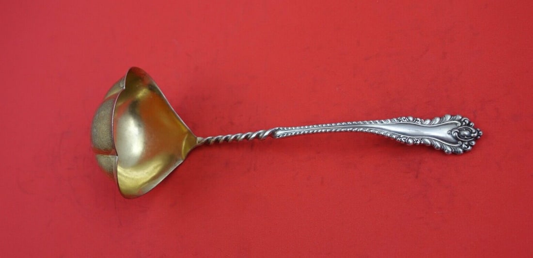 Dominick & Haff Mazarin Sterling Silver Bouillon Ladle Gold Wash Twisted Handle 7.5": Dominick & Haff Mazarin Sterling Silver Bouillon Ladle Gold Wash Twisted Handle 7.5" This exquisite bouillon ladle from the Mazarin pattern, crafted by Dominick & Haff, showcases the elegance of Victo