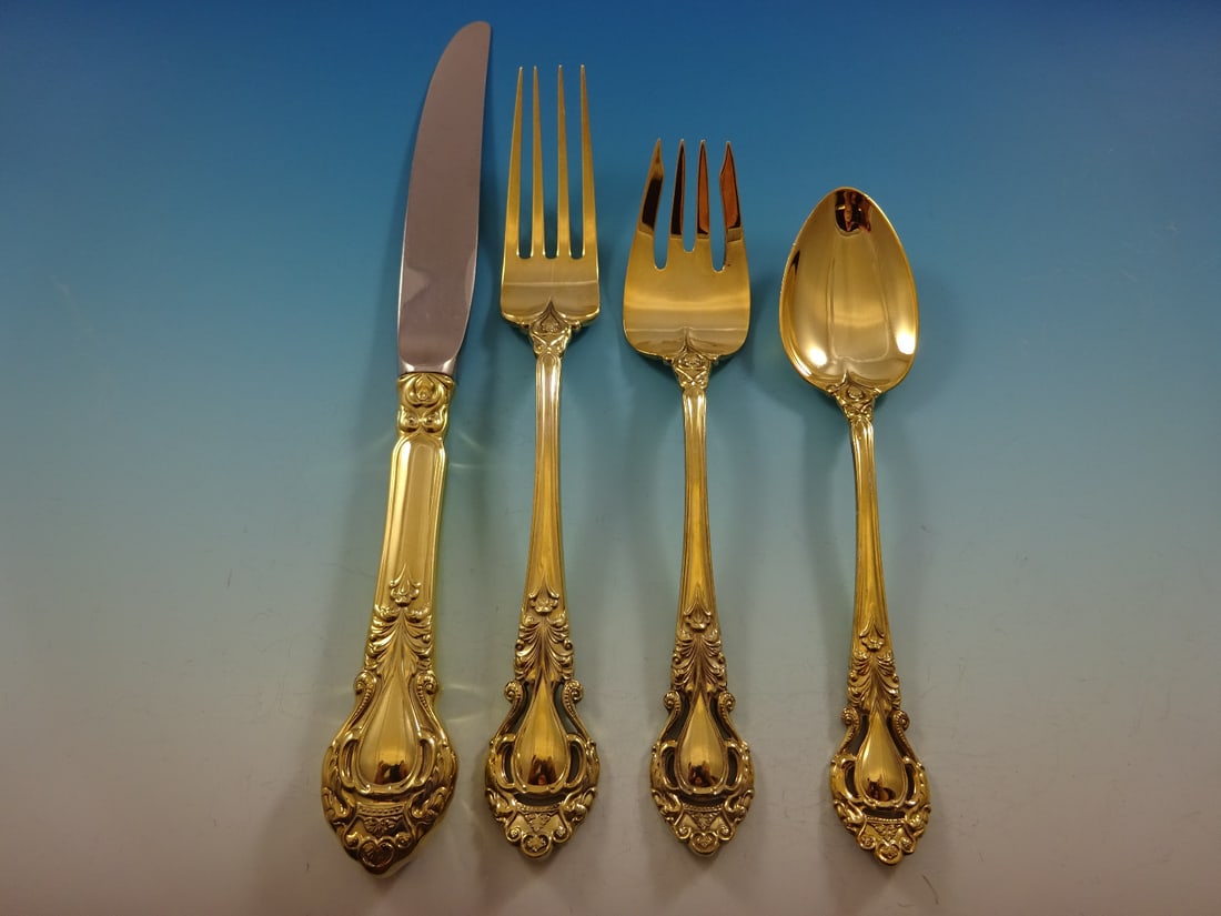 Kirk Stieff Royal Dynasty Gold Vermeil 48-Piece Sterling Silver Flatware Set: Kirk Stieff Royal Dynasty Gold Vermeil 48-Piece Sterling Silver Flatware Set This exquisite Royal Dynasty Gold flatware service set by Kirk Stieff is a stunning addition to any dining experience.