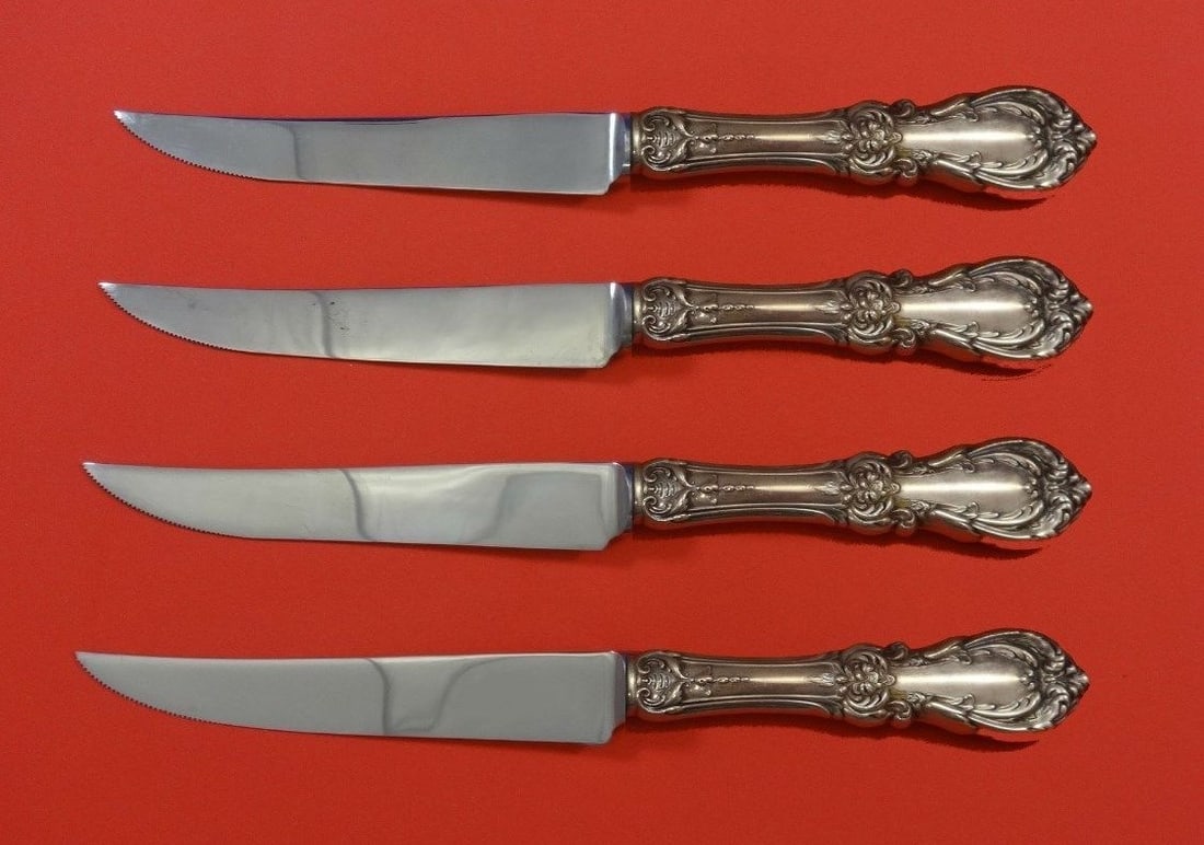Reed and Barton Burgundy Sterling Silver Steak Knife Set 4pc Custom: Reed and Barton Burgundy Sterling Silver Steak Knife Set 4pc Custom This exquisite 4-piece steak knife set showcases the elegant Burgundy pattern by Reed and Barton. Crafted from sterling silver with