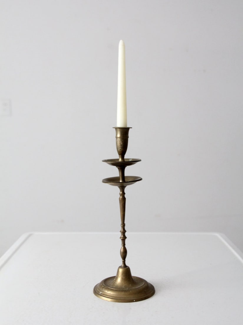 Vintage Etched Floral Brass Candlestick Holder 12.75 Inch: Vintage Etched Floral Brass Candlestick Holder 12.75 Inch Illuminate your space with this vintage brass candlestick holder, featuring a tall tapered design and a beautifully etched floral base. This p