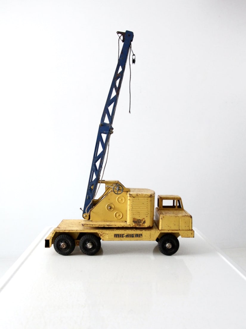 Vintage NY-Lint Clark Michigan T-24 Steel Toy Crane: Vintage NY-Lint Clark Michigan T-24 Steel Toy Crane This vintage NY-Lint steel-pressed toy crane is a classic Clark Michigan Equipment T-24 excavator. It showcases unique craftsmanship from its era, f