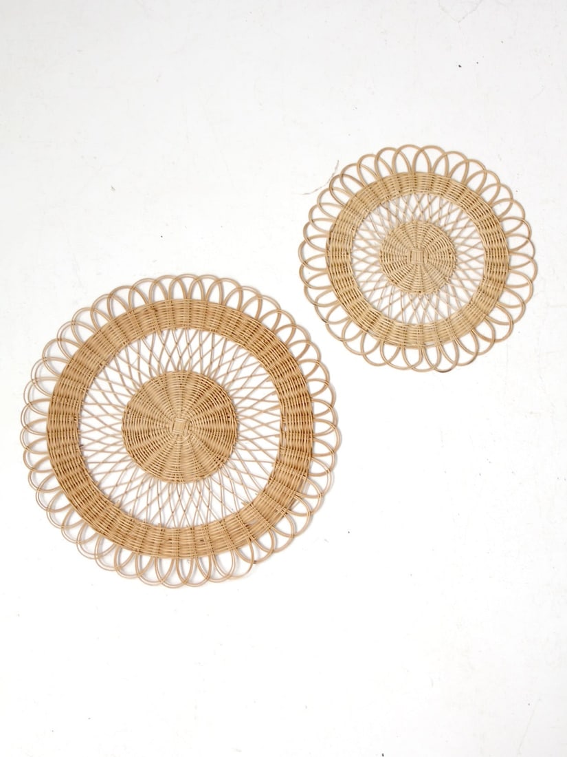 Intricate Vintage Rattan Placemats Pair for Dining or Wall Decor: Intricate Vintage Rattan Placemats Pair for Dining or Wall Decor This vintage pair of rattan placemats showcases an intricately woven design that adds warmth and texture to any setting. Perfect for us