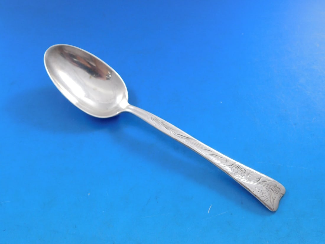 Tiffany & Co. Lap Over Edge Sterling Silver Teaspoon 6" Easter Lily: Tiffany & Co. Lap Over Edge Sterling Silver Teaspoon 6" Easter Lily This exquisite teaspoon is a stunning example of Tiffany & Co.'s craftsmanship, featuring the Lap Over Edge pattern. Crafted from hi