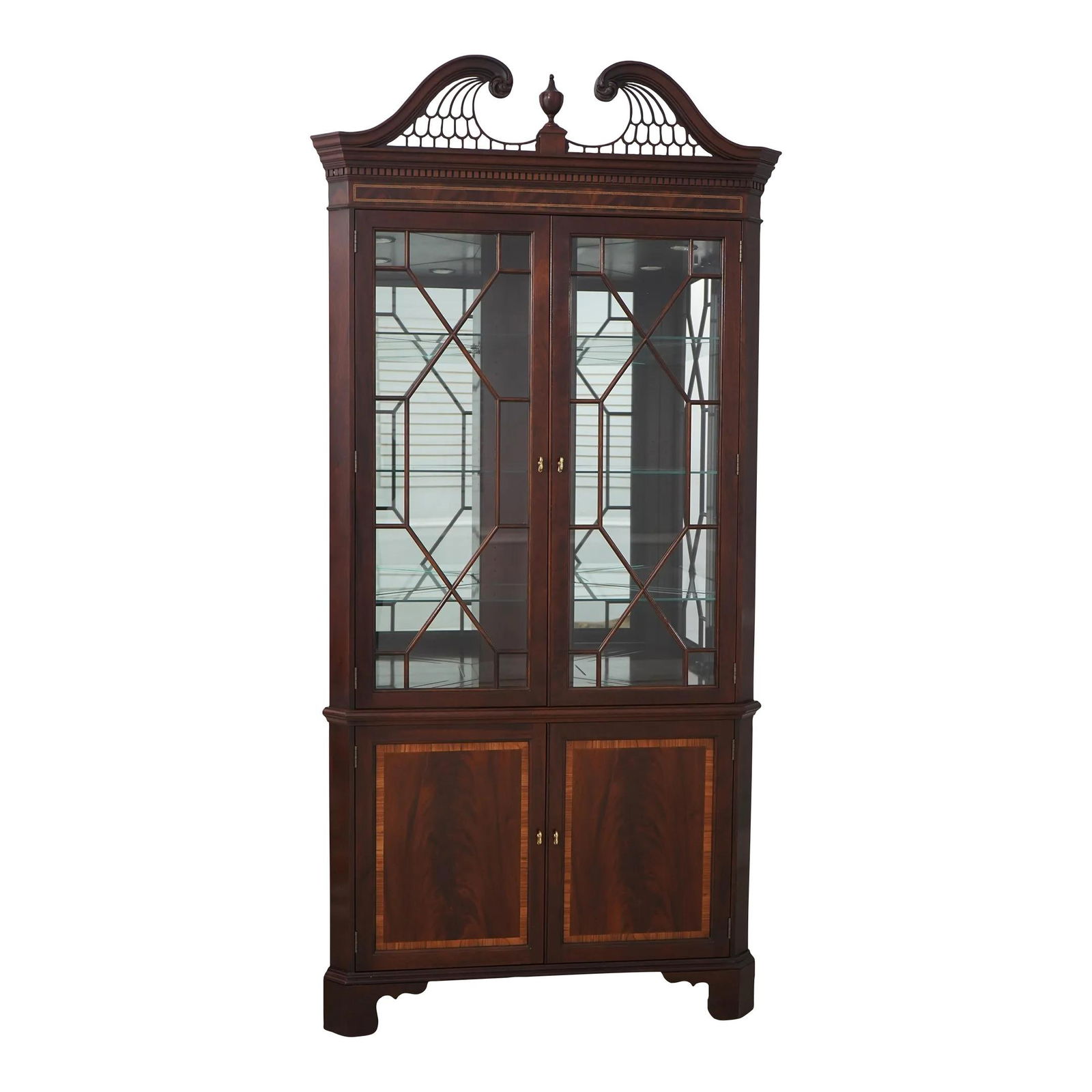 Stickley Chippendale Mahogany Corner China Cabinet Lighted Adjustable Shelves: Stickley Chippendale Mahogany Corner China Cabinet Lighted Adjustable Shelves This Stickley Chippendale Style Mahogany Corner China Cabinet, crafted around 1992, showcases an impressive combination of