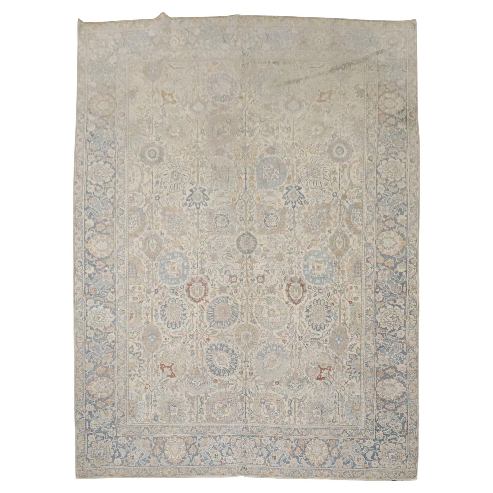 Early 20th Century Persian Tabriz Wool Rug 8' x 10' 9": Early 20th Century Persian Tabriz Wool Rug 8' x 10' 9" This early 20th-century Persian Tabriz rug features an ivory ground and is hand-woven from wool. Showcasing American Colonial style influences, i