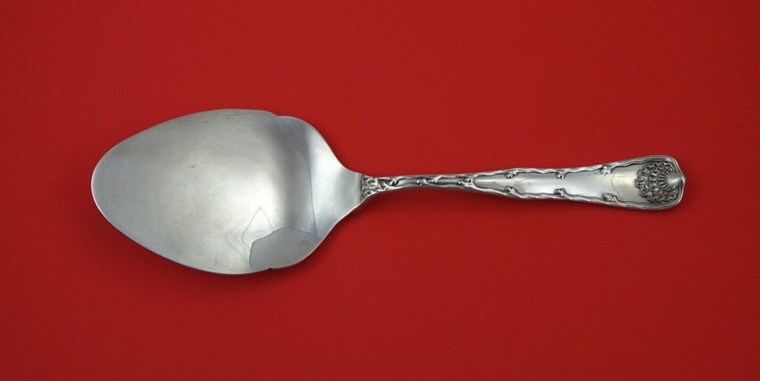 Tiffany & Co. Wave Edge Sterling Silver Pastry Server 9 1/2": Tiffany & Co. Wave Edge Sterling Silver Pastry Server 9 1/2" This exquisite pastry server from Tiffany & Co. showcases the elegant Wave Edge pattern, crafted from high-quality sterling silver. Measuri