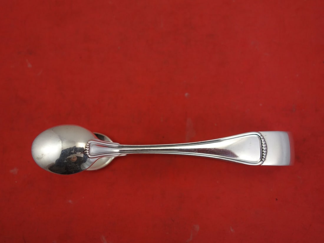 Buccellati Milano Sterling Silver Ice Tong 5 1/4" Serving Piece: Buccellati Milano Sterling Silver Ice Tong 5 1/4" Serving Piece Elevate your serving experience with this exquisite Milano by Buccellati ice tong, crafted from high-quality sterling silver. Measuring