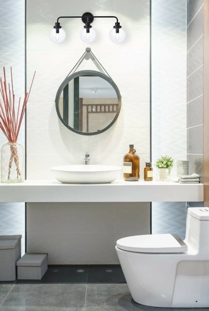 Hanson 3 Light Modern Wall Sconce Black Metal Clear Glass Shades: Hanson 3 Light Modern Wall Sconce Black Metal Clear Glass Shades Illuminate your space with this elegant 3-light wall sconce from the Hanson collection. Featuring a modern black metal finish combined