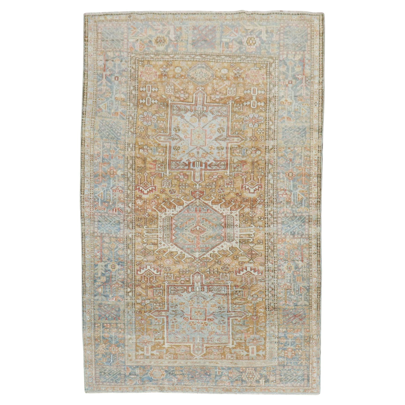 Antique Persian Heriz Rug Wool Hand-Woven 50 x 78 in: Antique Persian Heriz Rug Wool Hand-Woven 50 x 78 in This exquisite Persian Heriz rug features a warm apricot color field complemented by a light blue border, beautifully showcasing the traditional He